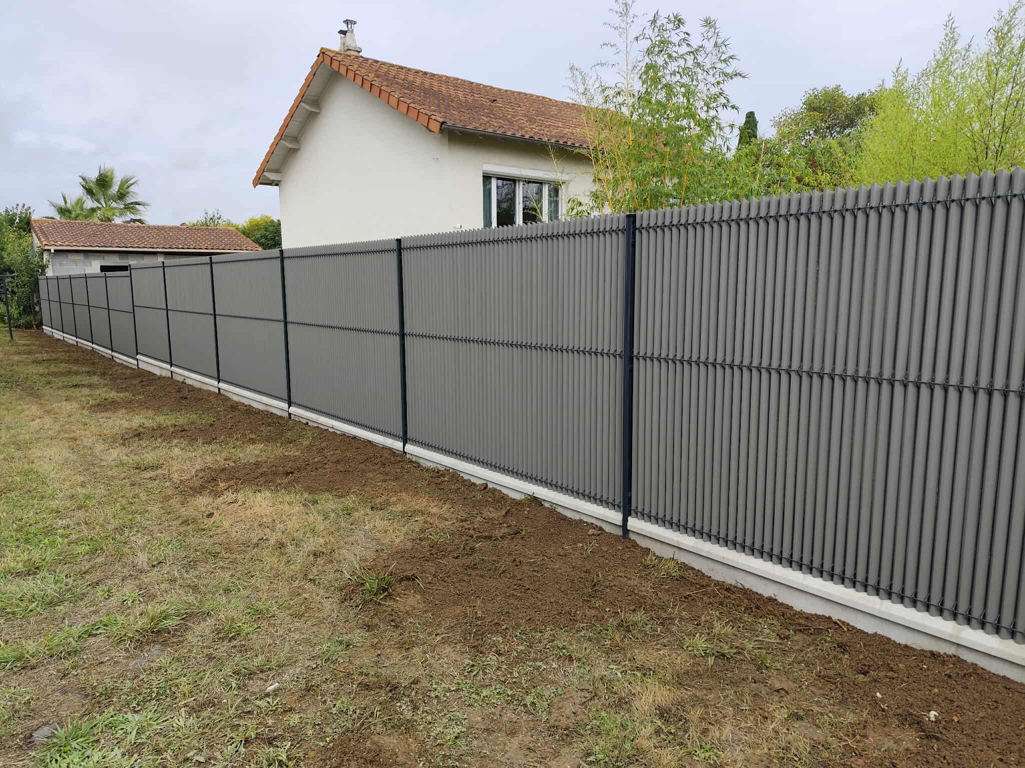 Pose clôture bois jaunay-marigne